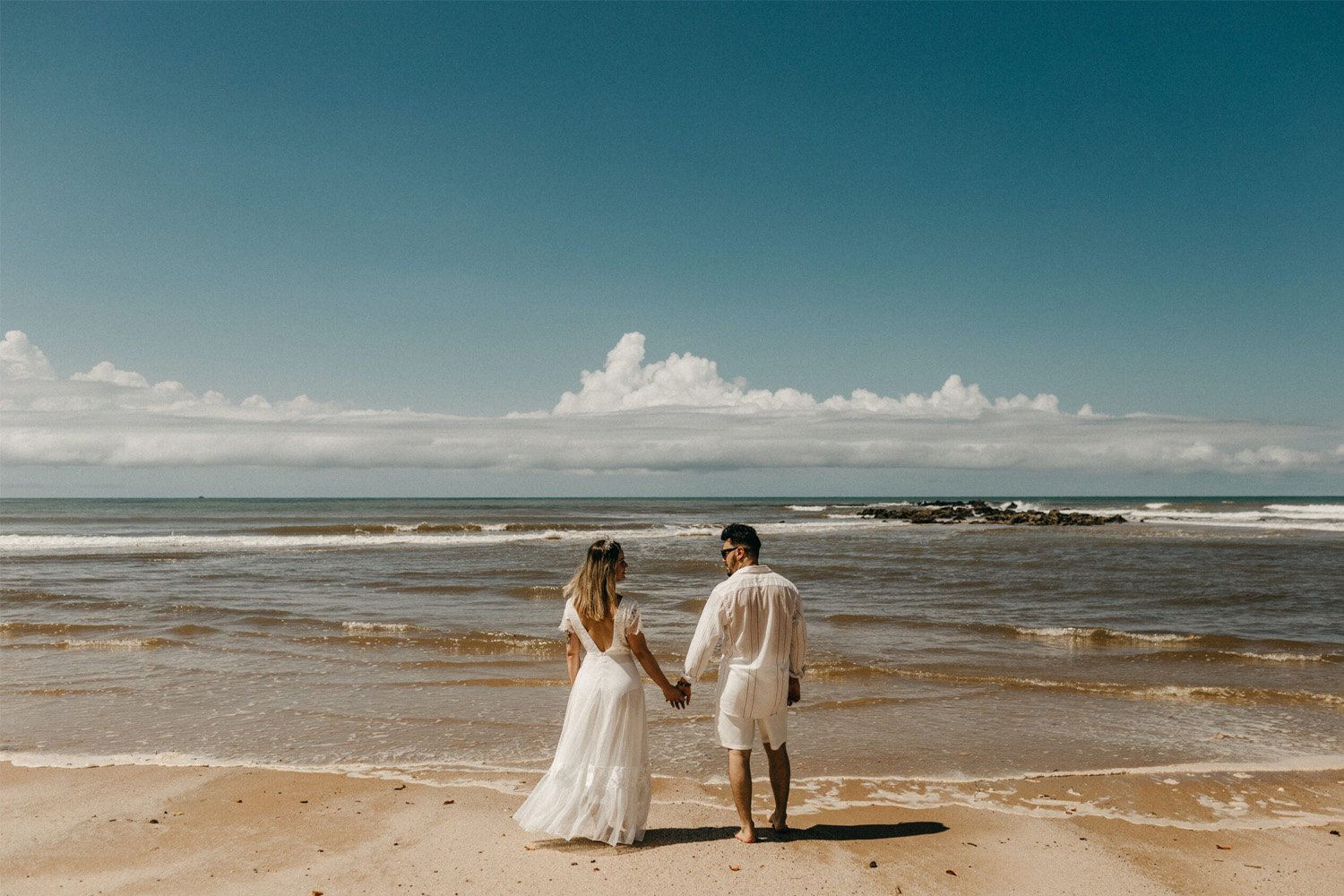 Wedding couple enjoys the beach in the Caribbean