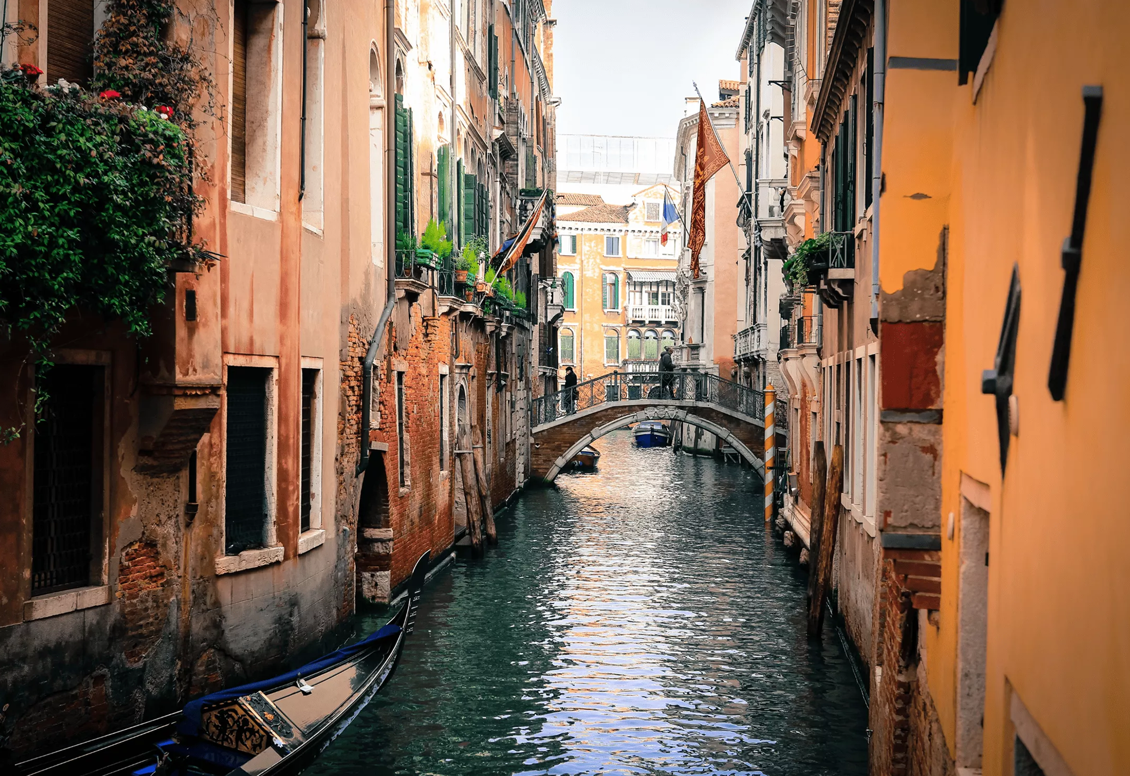 Venice canal with bridge and gondola