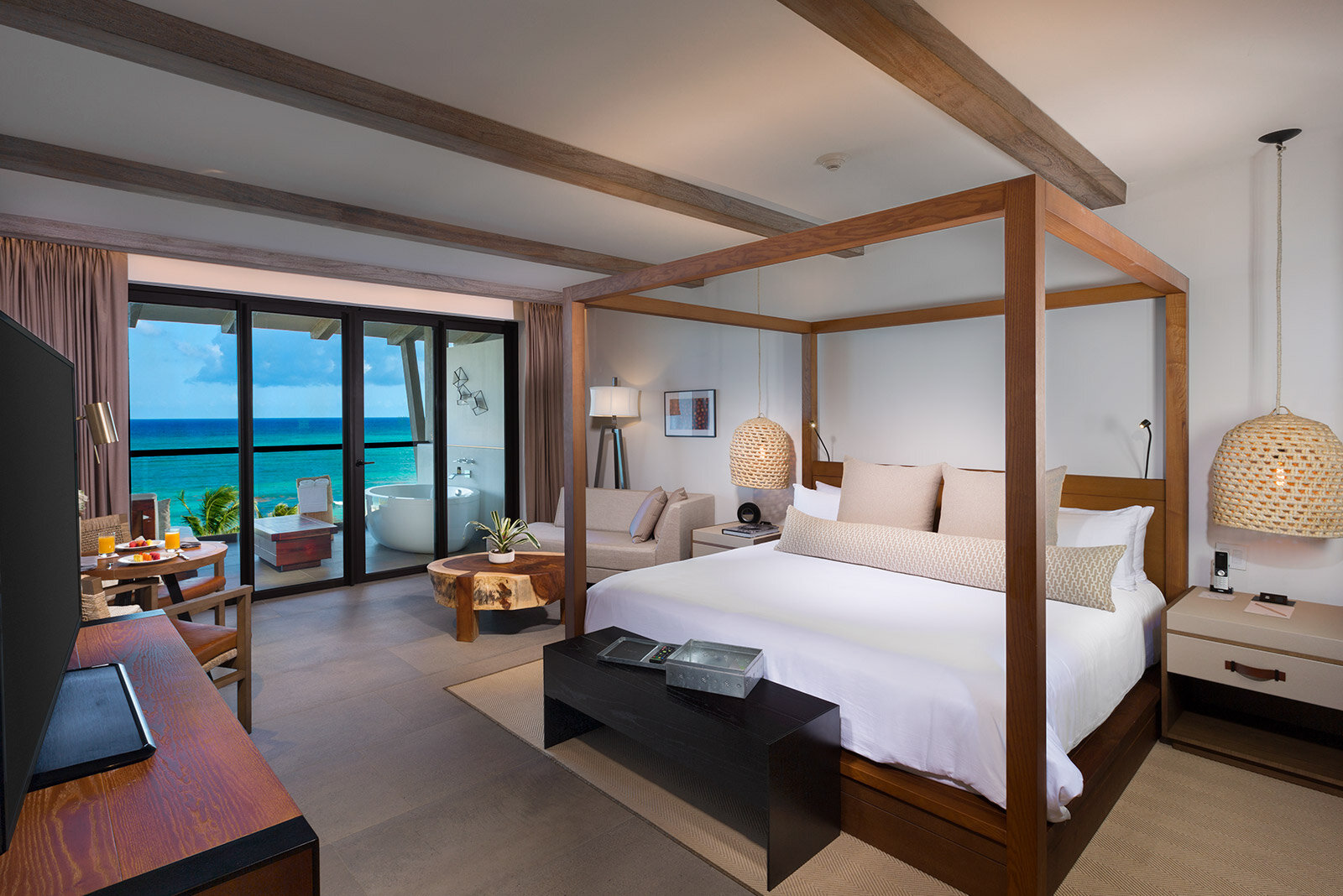 Luxury beachfront hotel room with ocean view.