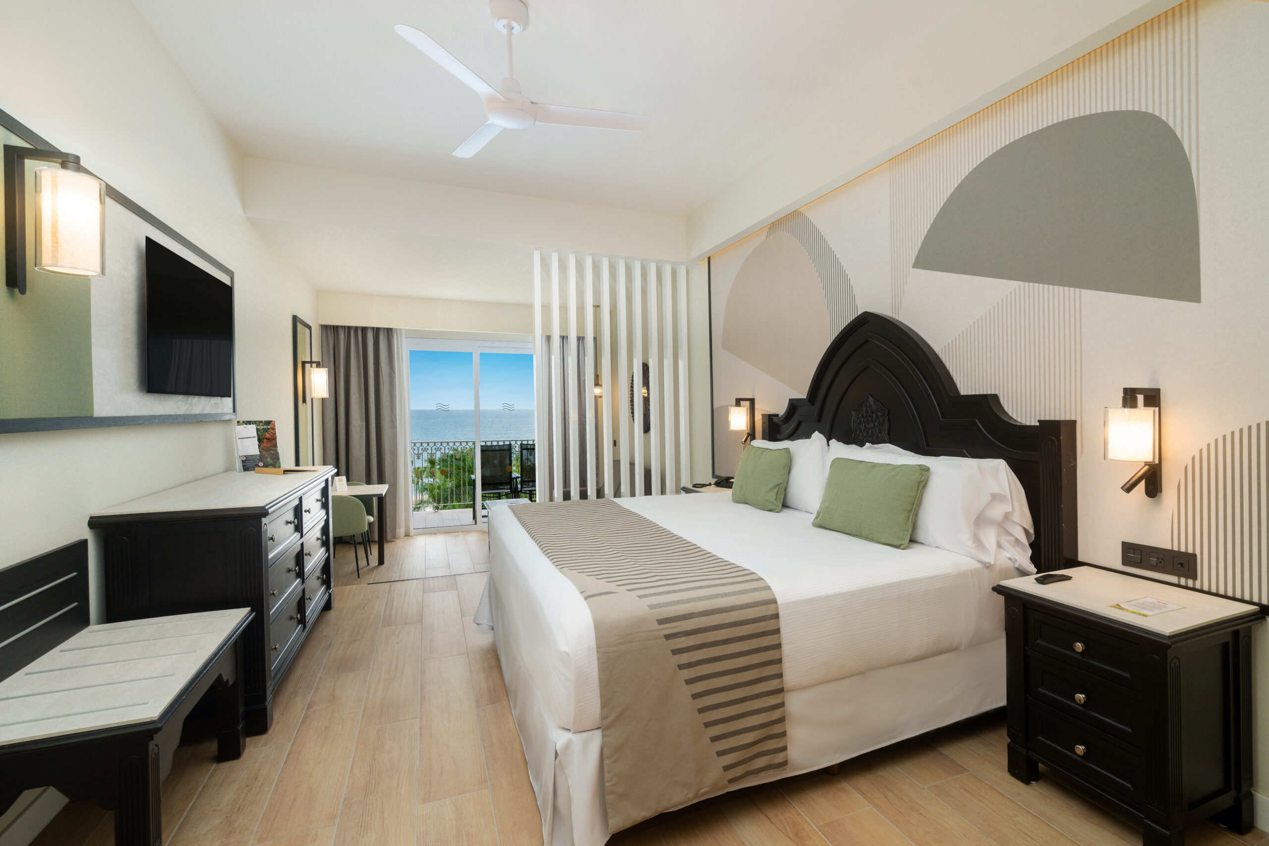 Luxury hotel room with ocean view balcony