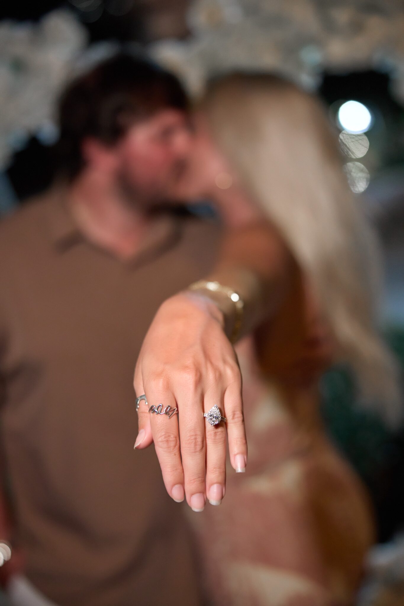 Jessica showing her engagement ring