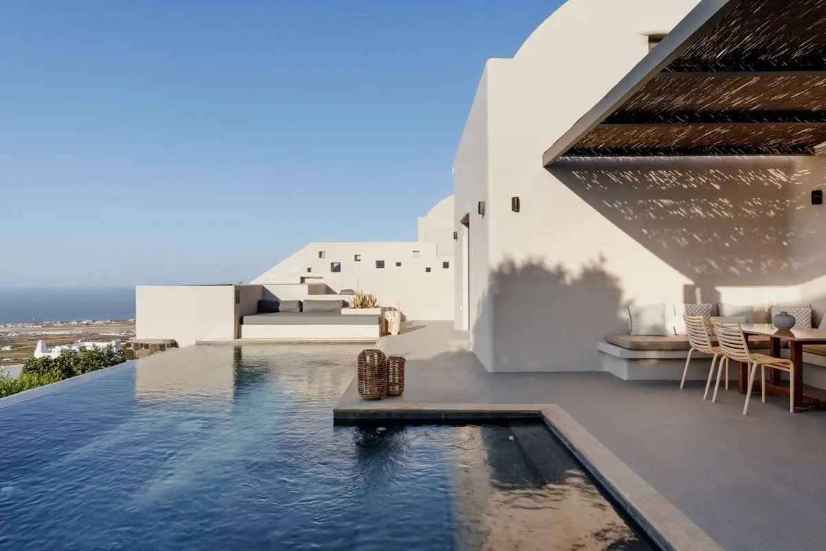 Villa terrace with private pool, plunge pool and shaded dining area