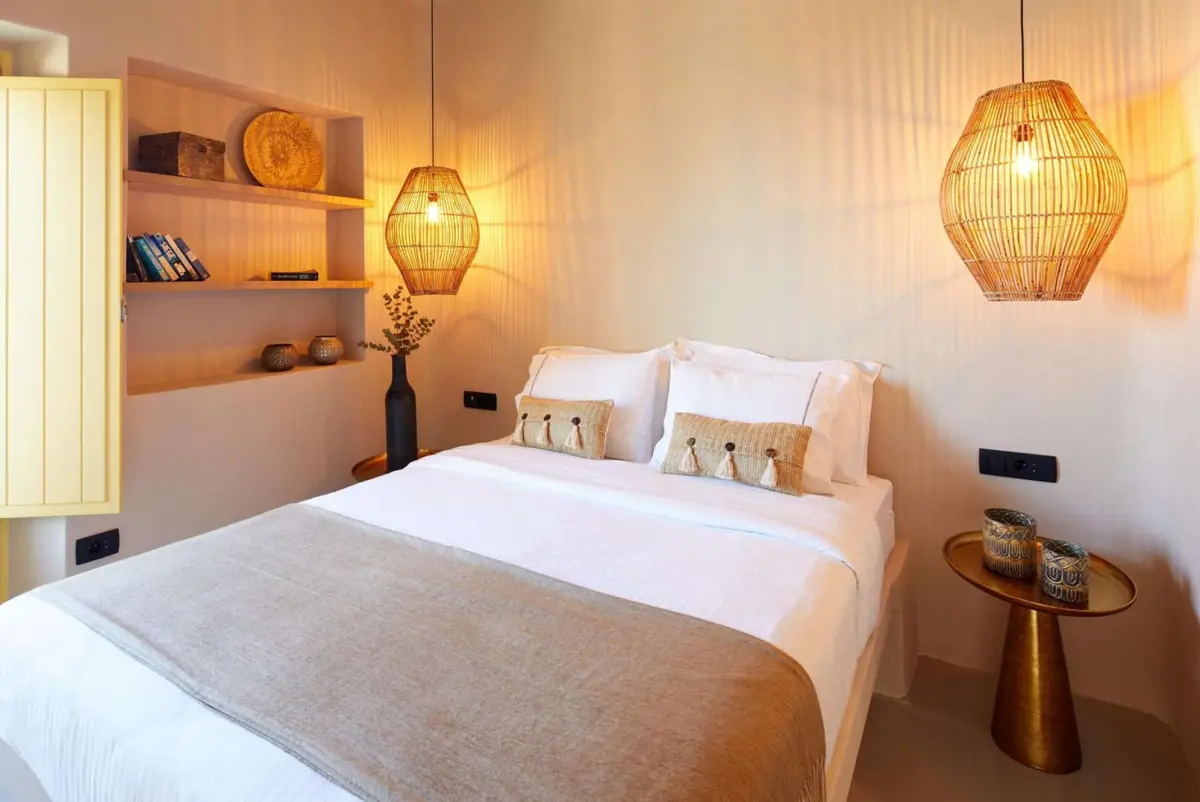 Villa bedroom with woven pendant lights