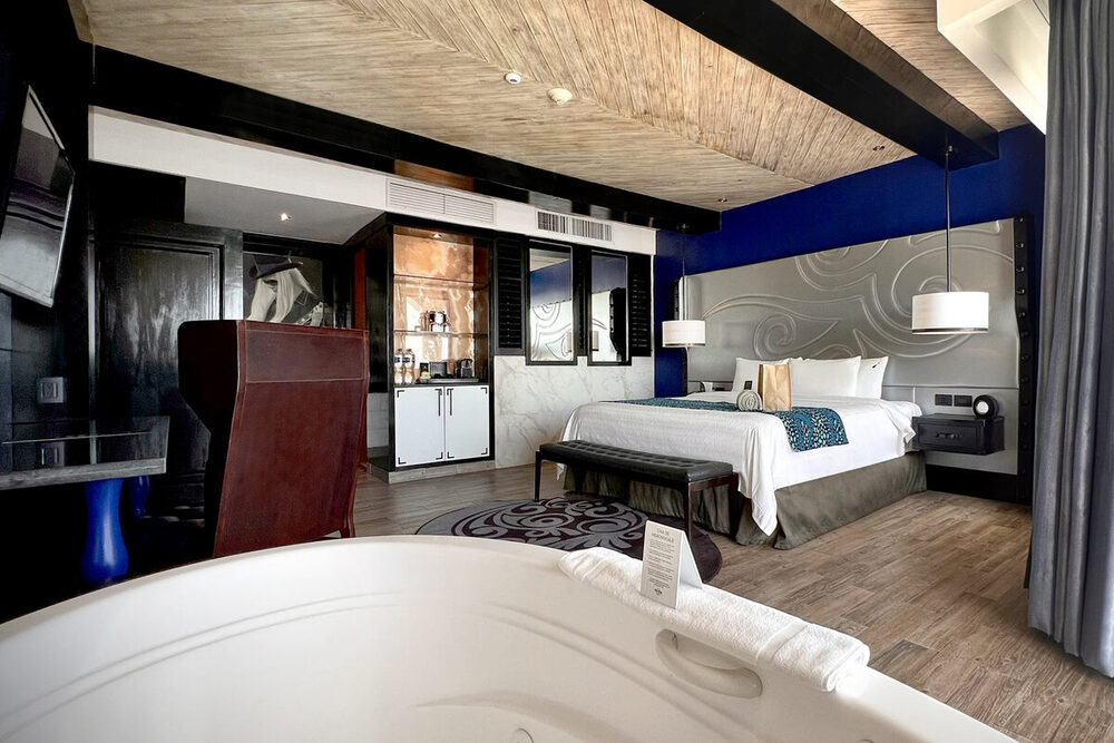 Rock Suite king bedroom with an in-room jacuzzi and wet bar, Heaven side